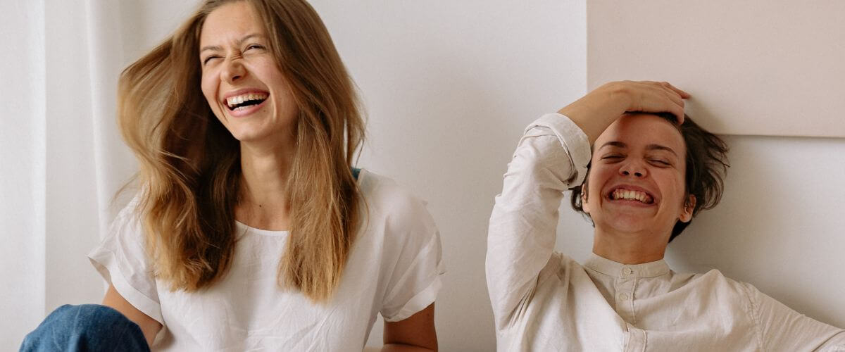 Couple laugh together, the building blocks of their partnership.